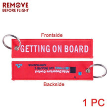 Load image into Gallery viewer, Remove Before Flight Car Keychains Berloques Red Embroidery Highlight Key Fobs Chains Jewelry Aviation Gifts Chaveiro Masculino
