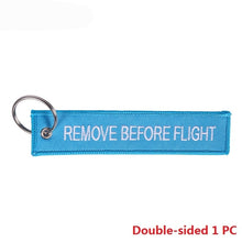 Load image into Gallery viewer, Remove Before Flight Car Keychains Berloques Red Embroidery Highlight Key Fobs Chains Jewelry Aviation Gifts Chaveiro Masculino
